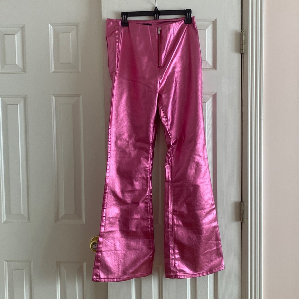 Bright Pink Metallic Look Coated Denim Flare Jeans from Pretty Little Thing!